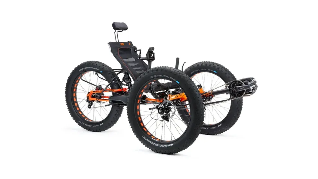 Accessible three-wheeled recumbent tricycle for disabled outdoor activities by a not-for-profit CIC, shown from rear/side, white background.