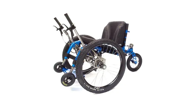 Mountain Trike MT5 11 All-terrain blue wheelchair for outdoor mobility, enabling disabled access to green spaces with our not-for-profit community programmes.