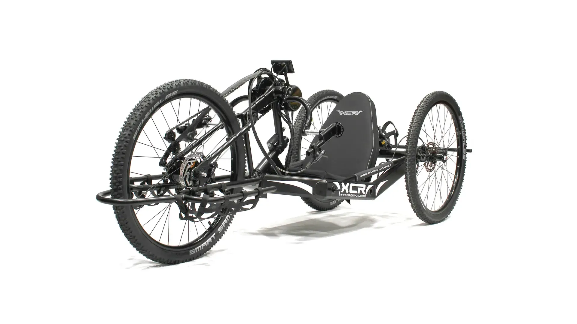 Sport-On XCR: Handcycle 6 Adaptive three-wheeled off-road handcycle with XCR branding, enabling disabled users to enjoy nature via inclusive cycling activities.